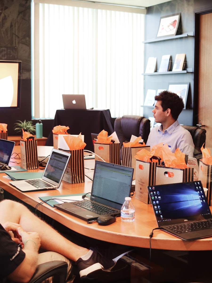 A laptop open on a desk with a clean workspace